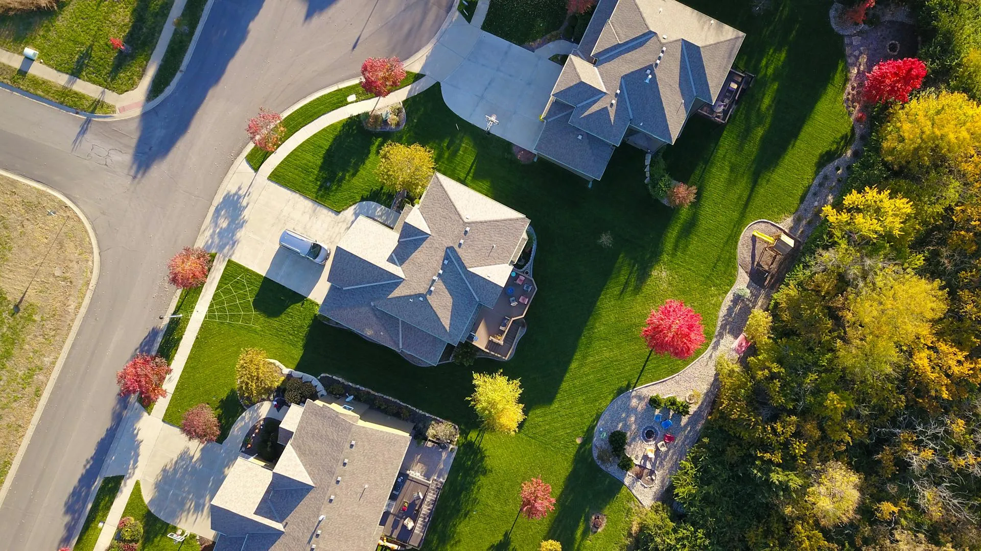Aerial view of residential asphalt-shingle rooftops in Cache Valley, Utah